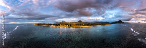 Aerial shot of Flic En Flac beach with stormy clouds, Mauritius, Africa photo