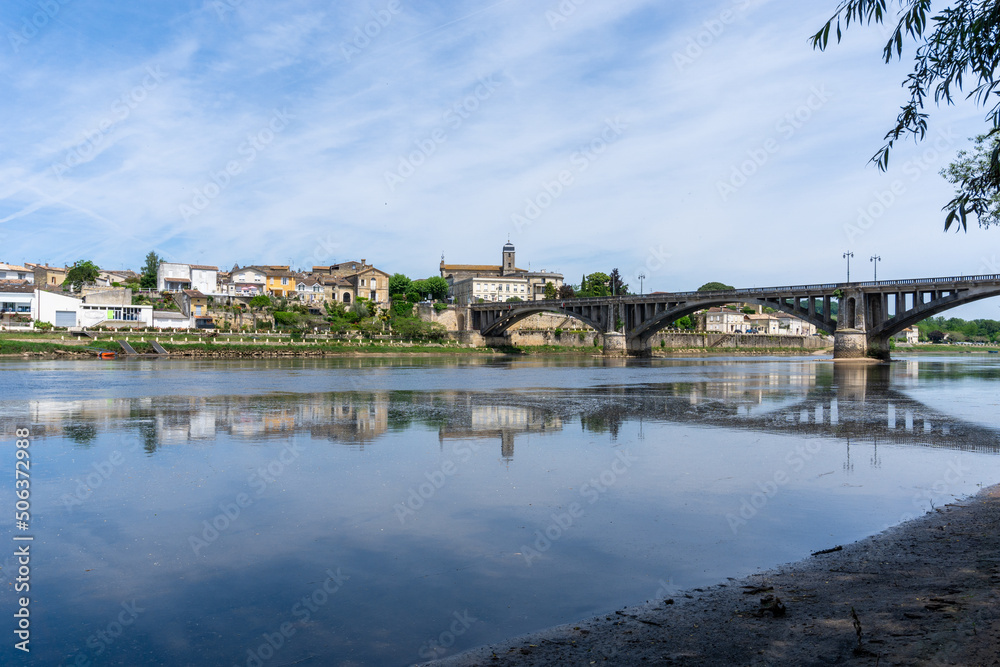 view of the Dordogne River and old stone bridge leading to Bergerac