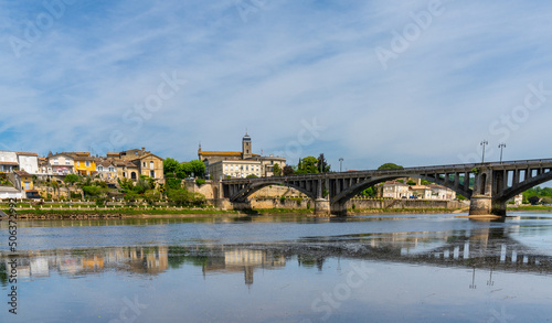 view of the Dordogne River and old stone bridge leading to Bergerac