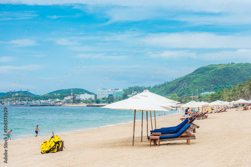 Nha Trang beach with umbrellas and chairs Nha Trang beach with umbrellas and chairs