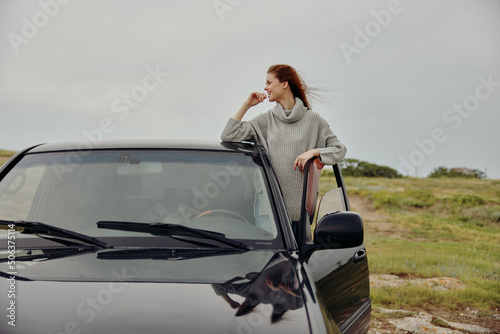 portrait of a woman Adventure car trip nature travel female relaxing
