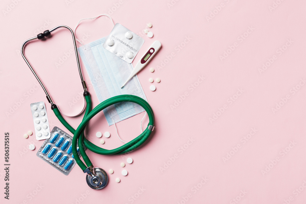 Medical background. Many different various medicine tablets or pills on the table with stethoscope. Close up. Healthcare pharmacy and medicine concept - obrazy, fototapety, plakaty 