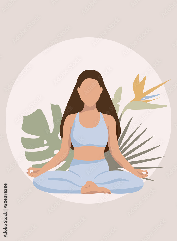 Beautiful woman is doing yoga and sitting in the lotus position