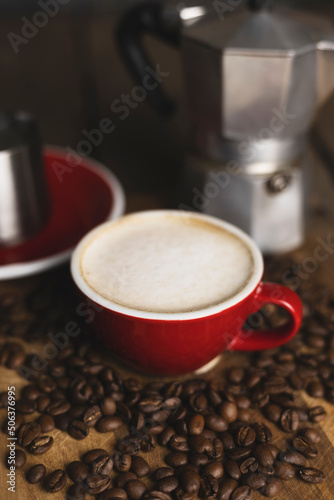 a cup coffee and moka with milk jug