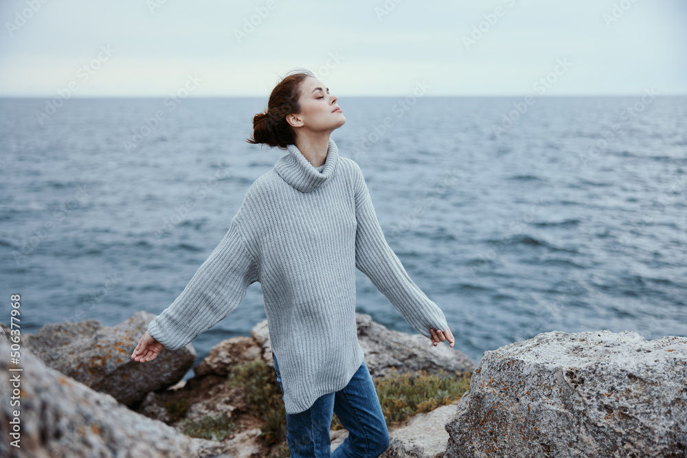 portrait of a woman nature rocks coast landscape Ocean female relaxing portrait of a woman nature rocks coast landscape Ocean female relaxing