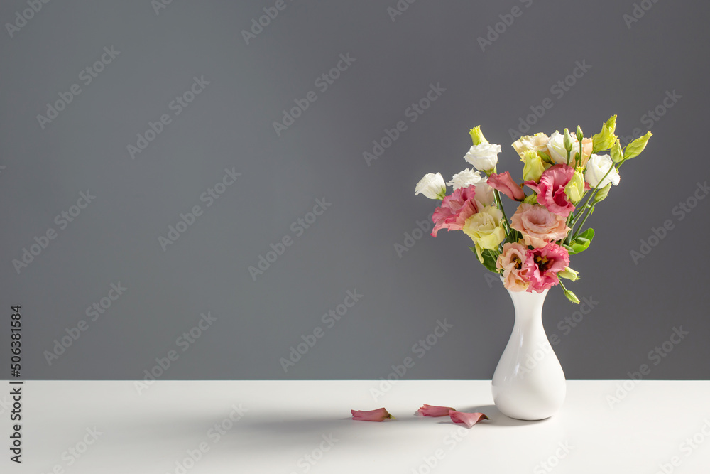 Fototapeta premium bouquet of eustoma on dark background