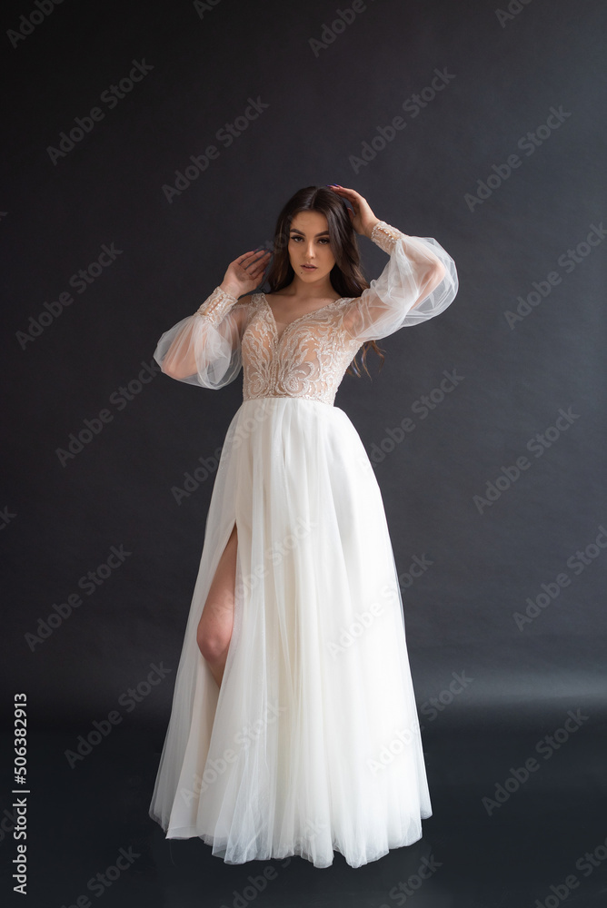 Fototapeta premium Beautiful bride perfect style. Wedding hairstyle make-up luxury wedding dress