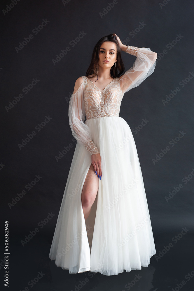 Beautiful bride perfect style. Wedding hairstyle make-up luxury wedding dress Beautiful bride perfect style. Wedding hairstyle make-up luxury wedding dress