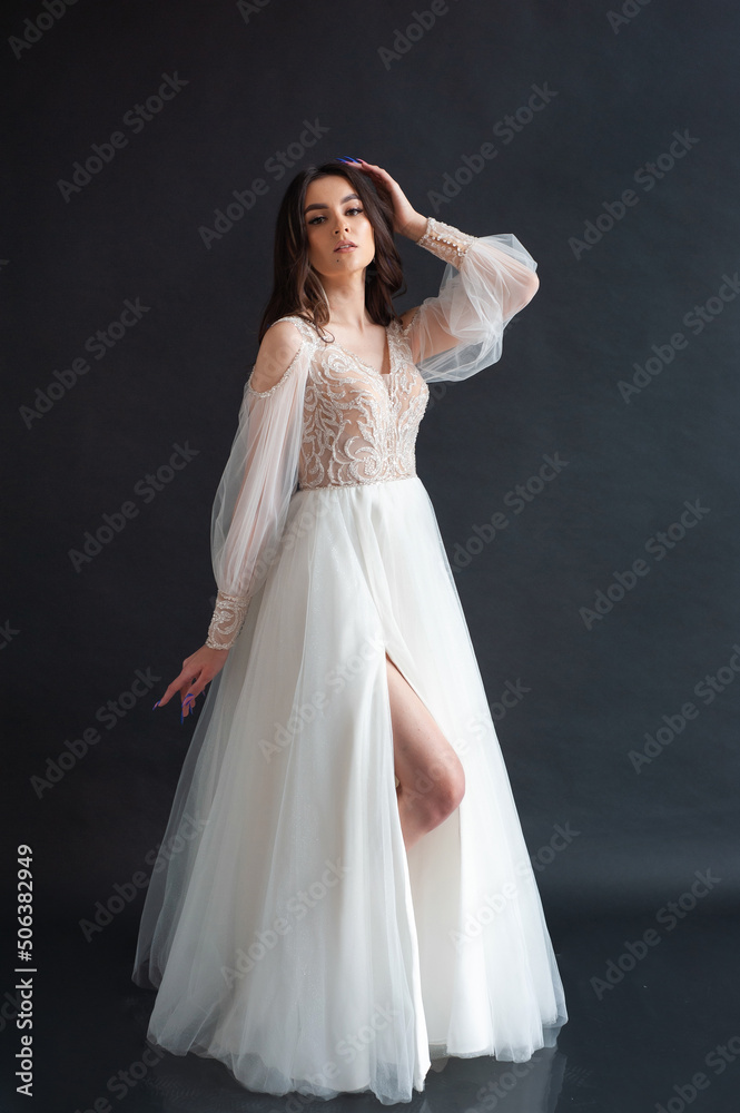 Beautiful bride perfect style. Wedding hairstyle make-up luxury wedding dress Beautiful bride perfect style. Wedding hairstyle make-up luxury wedding dress