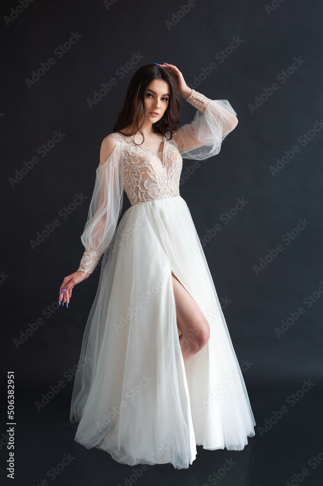 Beautiful bride perfect style. Wedding hairstyle make-up luxury wedding dress Beautiful bride perfect style. Wedding hairstyle make-up luxury wedding dress