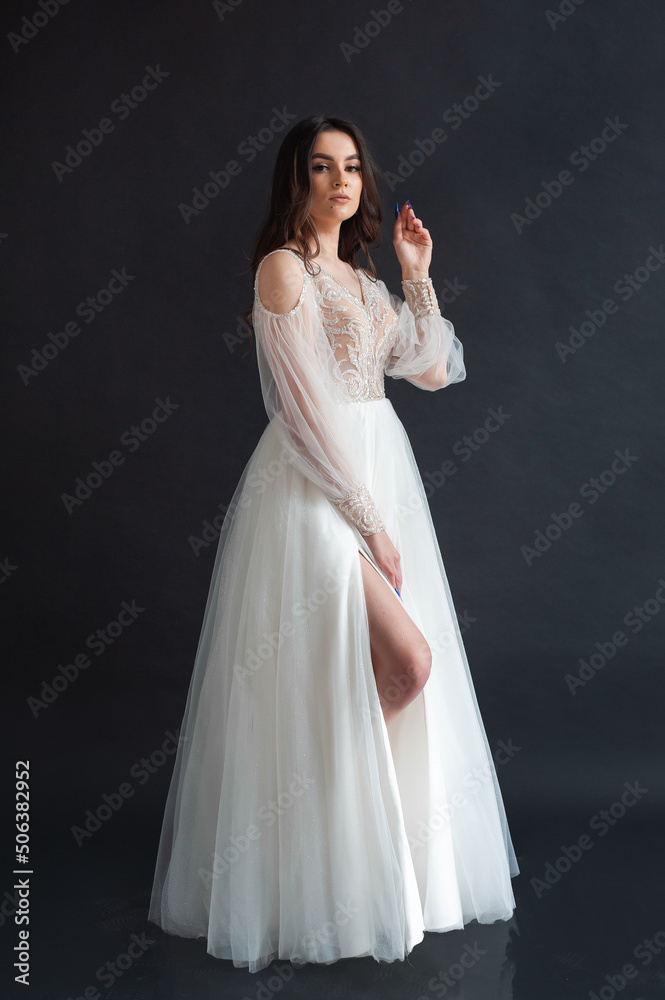 Beautiful bride perfect style. Wedding hairstyle make-up luxury wedding dress Beautiful bride perfect style. Wedding hairstyle make-up luxury wedding dress
