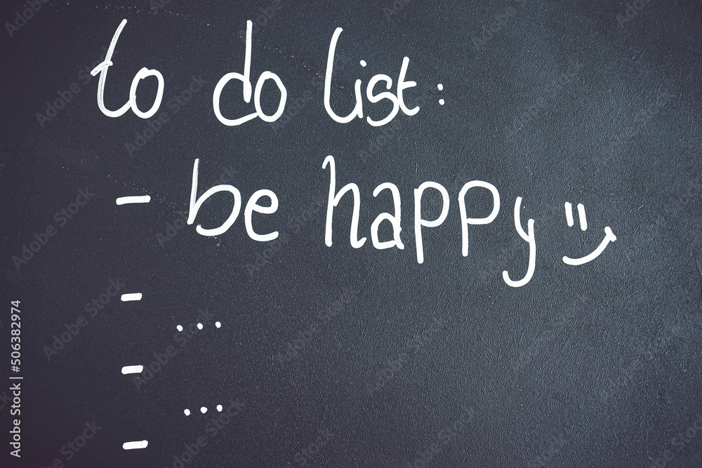 Motivational image about happiness as the most important thing in a to do list