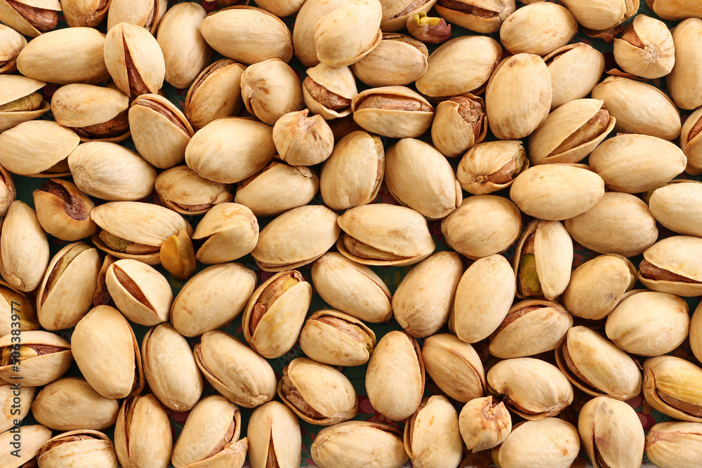 close up of unshelled pistachio nuts close up of unshelled pistachio nuts