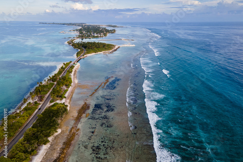 Aerial view of tropical beach landscape and local road at addu city, the southernmost atoll of Maldives in Indian ocean. Maldives tourism and summer vacation concepts photo