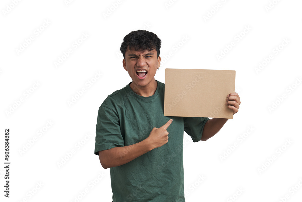 Young peruvian man screaming angry pointing at a board. Isolated over white background. Young peruvian man screaming angry pointing at a board. Isolated over white background.