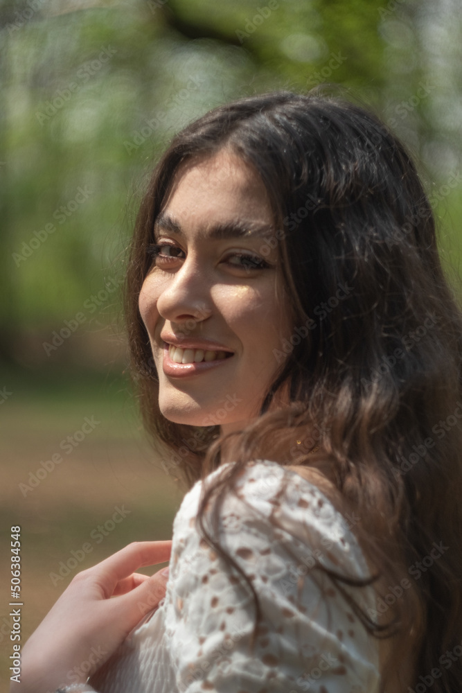 portrait of a young long hair woman smiling portrait of a young long hair woman smiling
