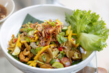 The pork satay salad is placed on the table still life healthy food concept.