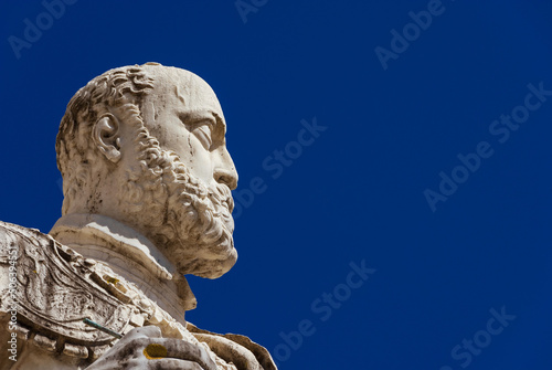 Cosimo I de' Medici, Grand Duke of Tuscany. A marble statue erected in 1596 in the historical center of Pisa (with blue sky and copy space) photo