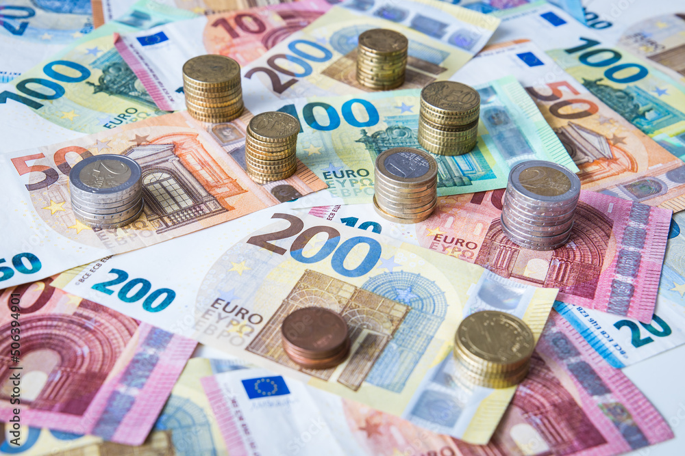 A combination of different Euro banknotes and Euro coins A combination of different Euro banknotes and Euro coins