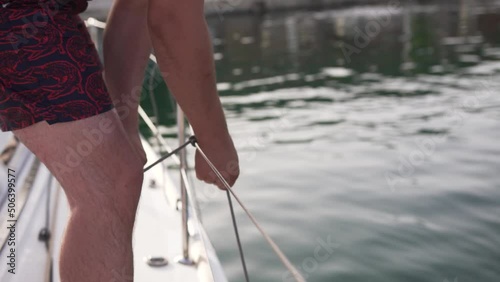 Close-up of hands knitting a marine knot of fenders. High quality FullHD footage