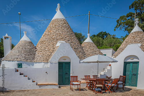 A trullo is a traditional Apulian dry stone hut with a conical roof. © Marcin