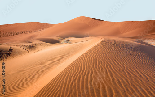 Fotografering Panoramic view of orange sand dune desert with clear blue sky at Namib desert -