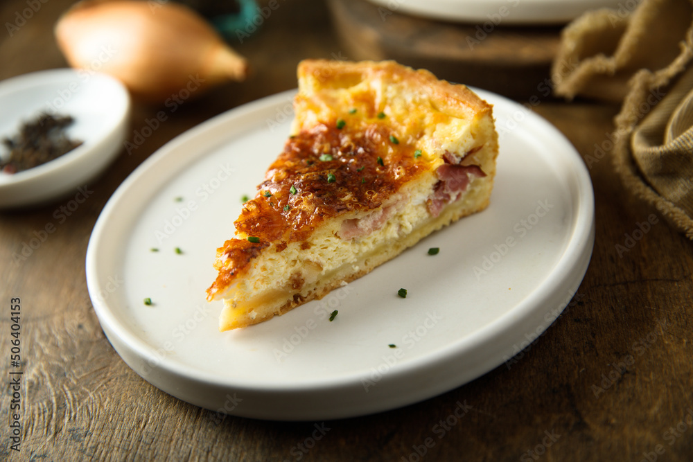 Traditional homemade French quiche with onion and bacon Traditional homemade French quiche with onion and bacon
