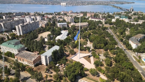 Ukrainian flag in Mykolaiv. Large ukrainian flag. Symbol of Ukraine  photo