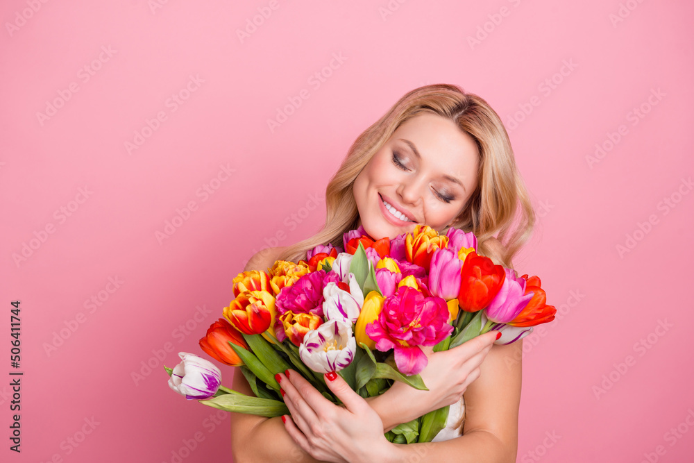 Photo of funny dreamy woman wear white dress enjoying blowers bunch aroma empty space isolated pink color background