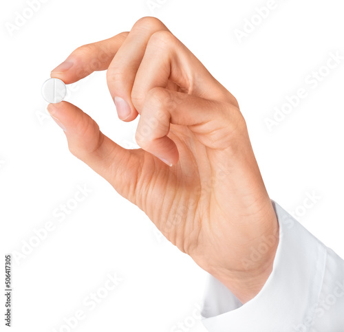 Human hand holding white pill isolated on white background. Pharmacy, pharmacology, medicine