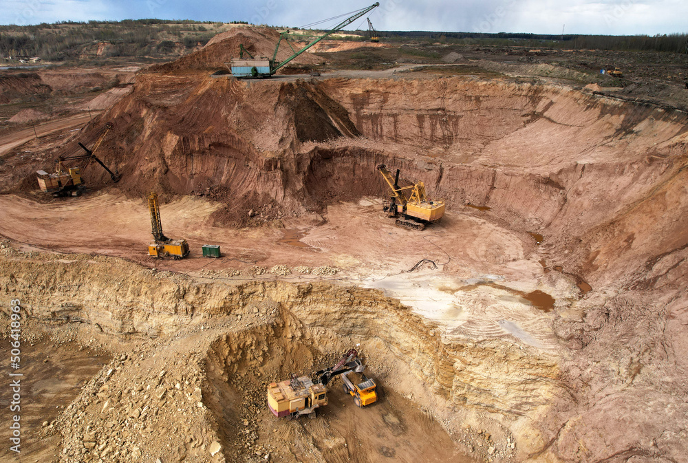 Walking dragline excavator in open pit mining. Mining clay in quarry ...