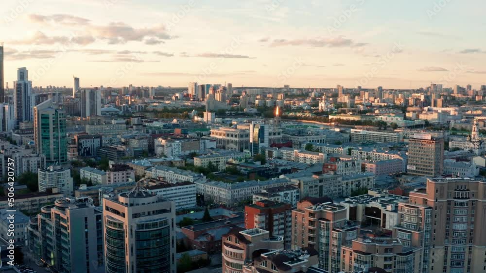View of the city at sunset in summer View of the city at sunset in summer