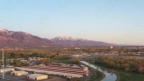 Industrial area of Ogden Utah with storage units and water canal. Aerial birds eye view. photo