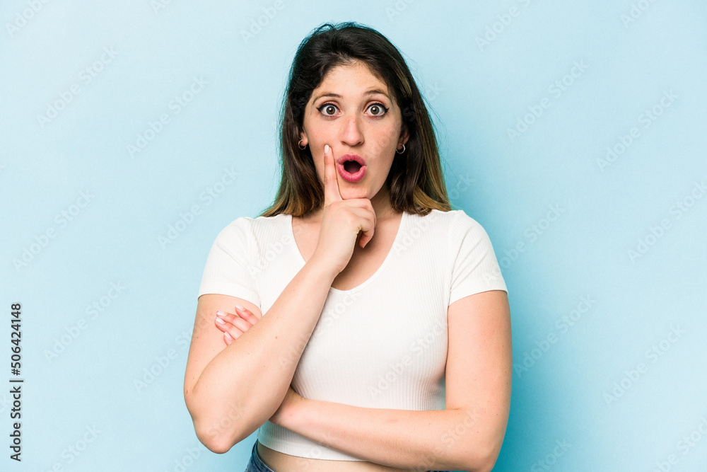 Young caucasian woman isolated on blue background having some great idea, concept of creativity. Young caucasian woman isolated on blue background having some great idea, concept of creativity.