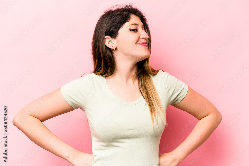 Young caucasian woman isolated on pink background dreaming of achieving goals and purposes Young caucasian woman isolated on pink background dreaming of achieving goals and purposes