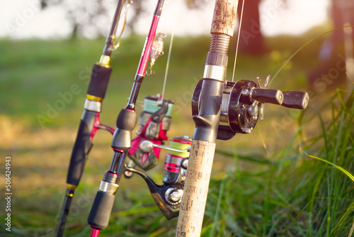 Fotografie, Obraz Spinning rods with reels and lures ready for fishing