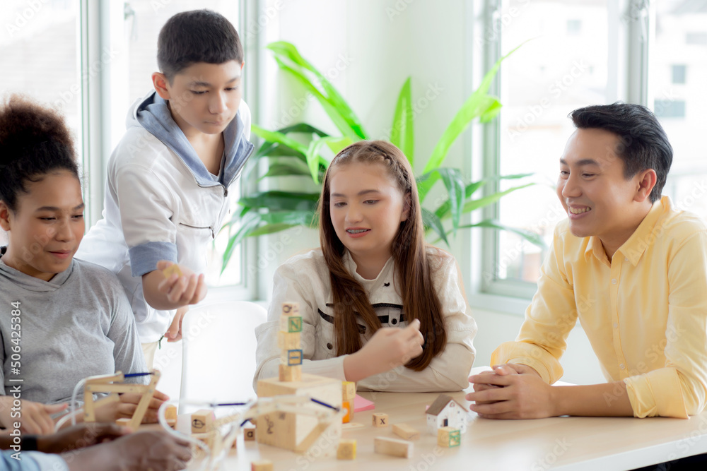 Young teacher and student doing activity playing block wooden for development together with enjoy and fun in the classroom at the school, studying and learning, back to school, education concept. Young teacher and student doing activity playing block wooden for development together with enjoy and fun in the classroom at the school, studying and learning, back to school, education concept.