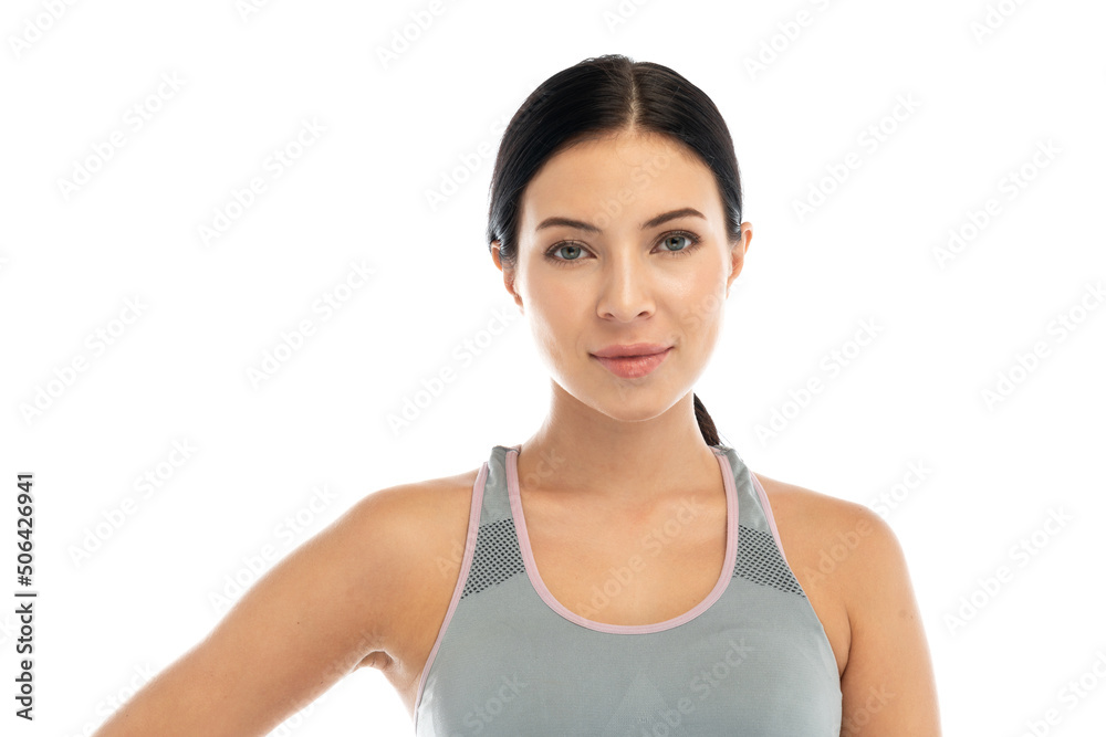 Portrait sport beauty fit body slim woman in sportswear relax and look at camara do fitness exercise training.Diet concept.Fitness and healthy lifestyle on white background Portrait sport beauty fit body slim woman in sportswear relax and look at camara do fitness exercise training.Diet concept.Fitness and healthy lifestyle on white background