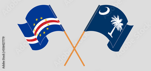 Crossed and waving flags of Cape Verde and The State of South Carolina