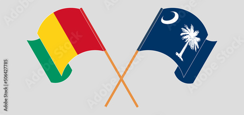 Crossed and waving flags of Guinea and The State of South Carolina