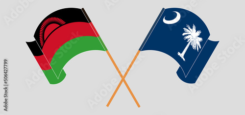 Crossed and waving flags of Malawi and The State of South Carolina