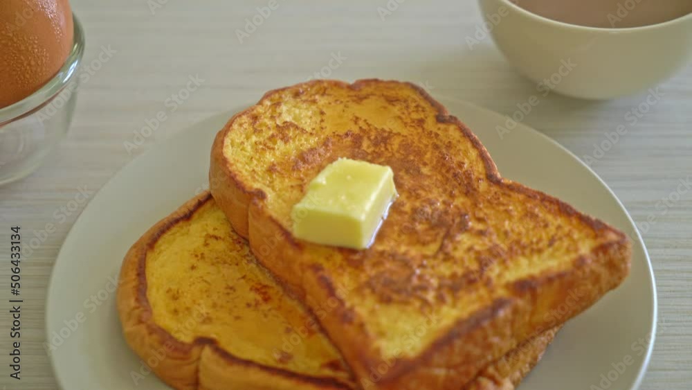 French toasted with butter and honey for breakfast French toasted with butter and honey for breakfast