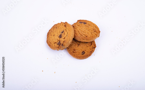 Falling broken chocolate chip cookies isolated on white background 