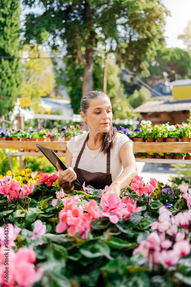 Woman Working in Greenhouse Portrait
