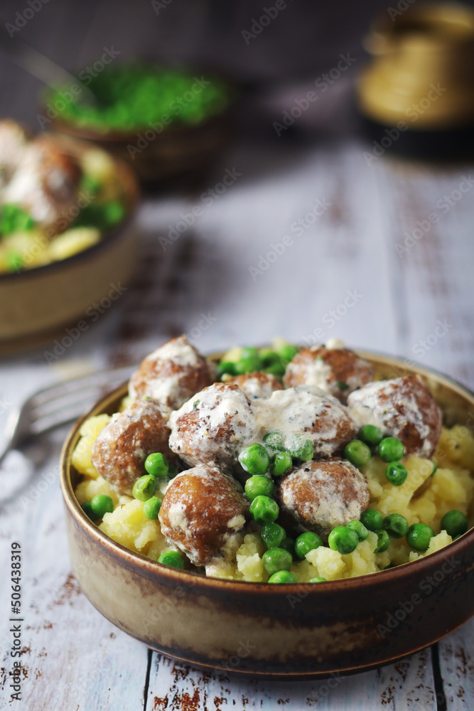 Swedish meatballs with mashed potato side dish - typical dish of Swedish cuisine Swedish meatballs with mashed potato side dish - typical dish of Swedish cuisine