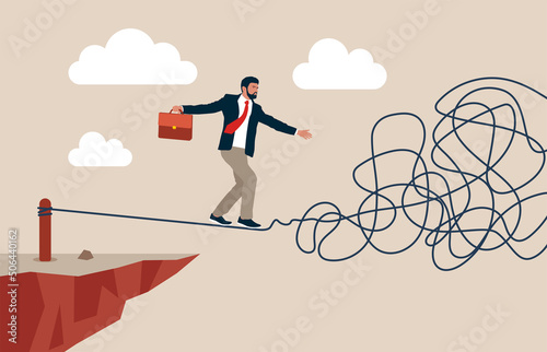 Businessman walking on twisted rope high in sky