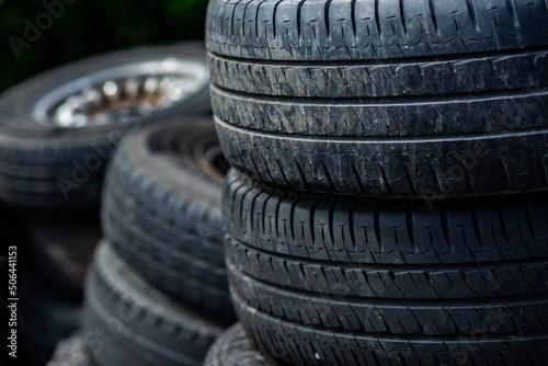 Old tyres in pile at tip for recycling