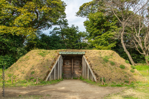 Traditional hut at the Edo period 'Shinsenza Kamoba' wild duck hunting site built in 1700s in Hamarikyu Gardens, Tokyo, Japan photo