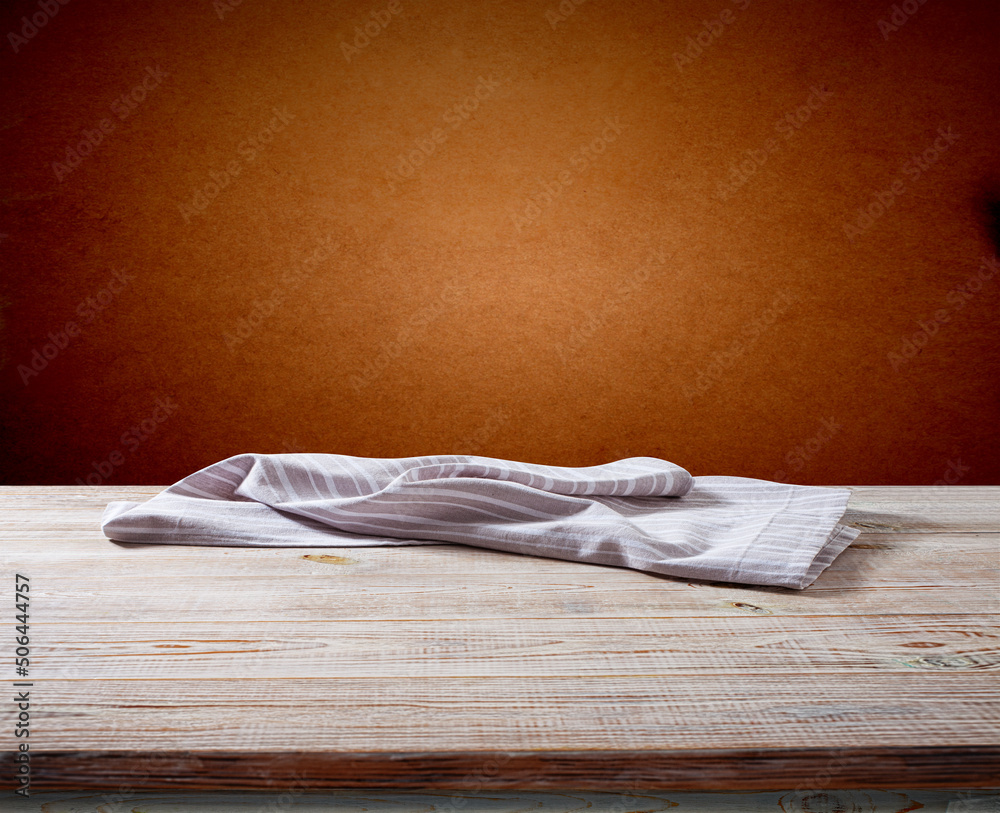 White napkin, table cloth on wooden deck mockup.