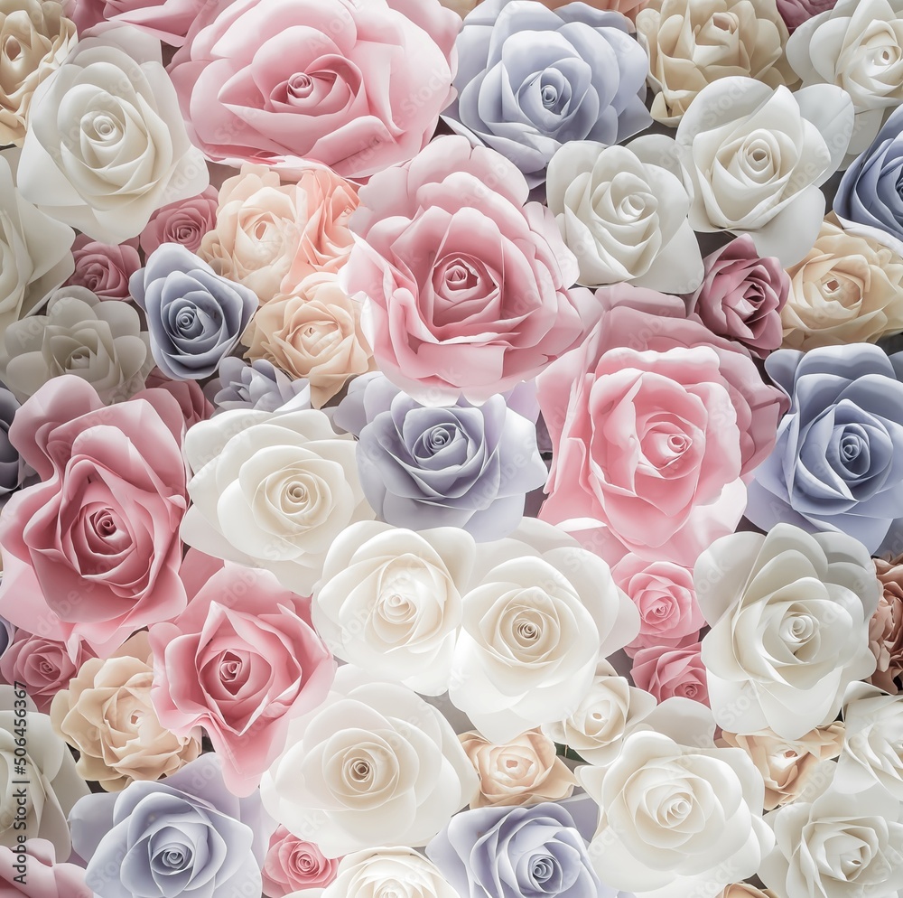 Fondo con multitud de rosas en varios tonos de azul, blanco y rosa, con colores calidos